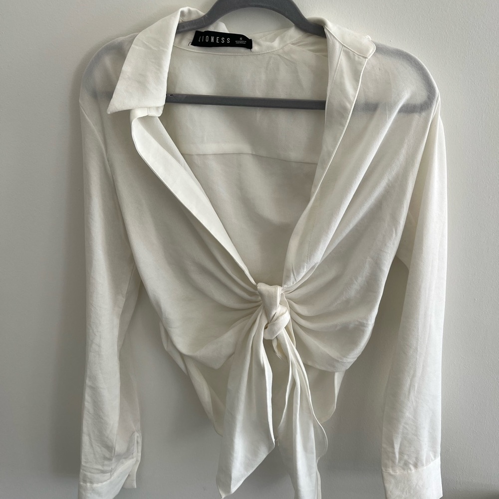 Lioness white top